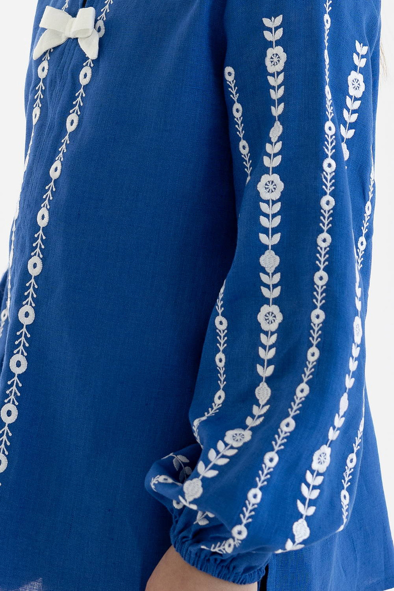 Embroidered blouse for a girl made of blue linen "Yarynka"